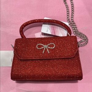 Glittery Red Handbag with Bow Accent